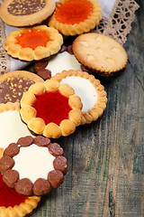 Image showing Cookies with chocolate and jelly filling.