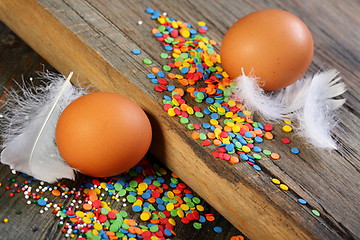 Image showing Eggs, feathers and Easter decorations.