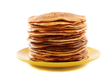 Image showing Stack of pancakes on a yellow plate.