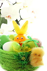 Image showing Colorful Easter eggs and orange rabbit. 