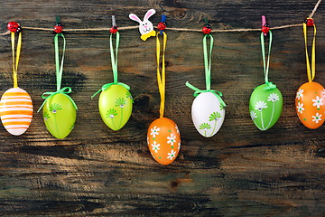 Image showing Colorful Easter eggs on a fun clothespins.