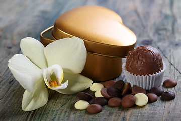 Image showing Handmade chocolates and flowers.