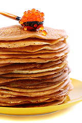 Image showing Stack of pancakes and a spoon with red caviar.