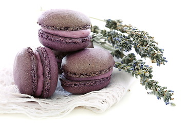 Image showing Lavender macaroons on linen napkin. 