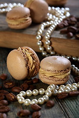 Image showing Homemade macaroons and coffee beans.