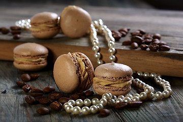 Image showing Almond cakes, coffee beans and pearl.