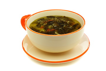 Image showing Cup of soup with fresh sorrel