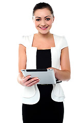 Image showing Business executive browsing on tablet device