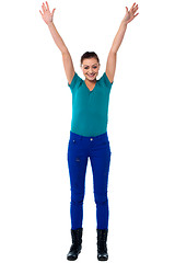 Image showing Jubilant young woman in trendy attire