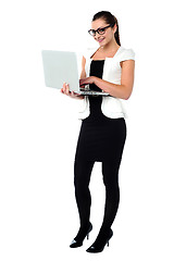 Image showing Female secretary using laptop