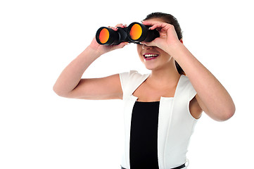 Image showing Lady looking through the binocular