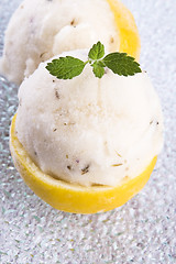 Image showing lemon sorbet with lavender in cups of lemon