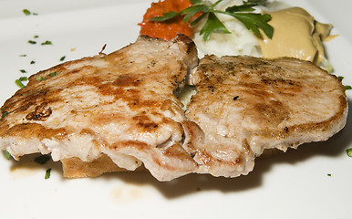 Image showing pork fillet dinner with buckwheat and mustard  photographed in L