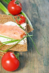 Image showing Bread with salmon, cream cheese and green onions. 