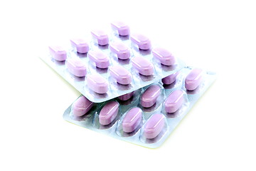 Image showing Blisters with purple pills.