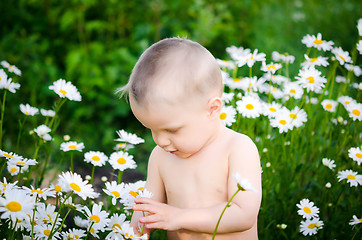 Image showing child with flowers