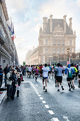 Image showing Spectators and participants of the annual Paris Marathon on the 