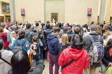 Image showing Visitors admire the portrait of Mona Lisa