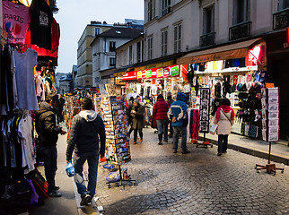 Image showing Evening buzz around the souvenir shops in Paris, France