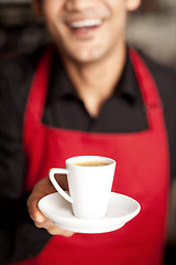 Image showing Freshly brewed coffee served with a smile