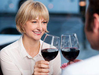 Image showing Couple toasting in a restaurant