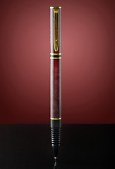 Image showing isolated red and golden pen