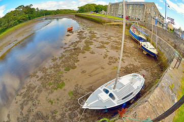 Image showing boats on the river shore