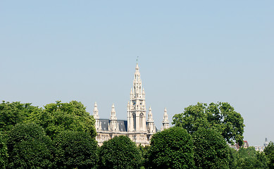 Image showing Vienna City Hall beyond the trees in Heldenplatz, Austria