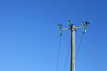 Image showing Powerline on wooden pillar