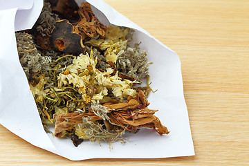 Image showing Chinese herbal medicine in paper packing