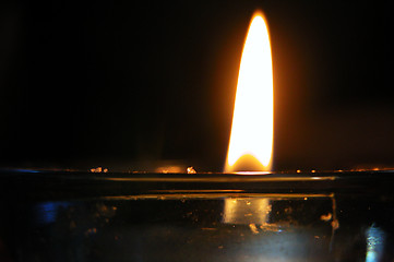 Image showing candle in a blue glass