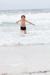 Image showing young little boy in water summer holiday fun sea 