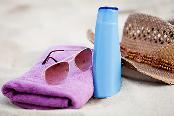 Image showing sunprotection objects on the beach in holiday