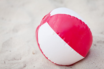 Image showing beach ball in sand on the beach summertime holiday