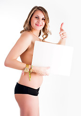 Image showing sexy nude woman holding blank banner