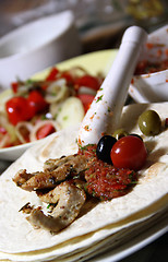 Image showing Mexican food with tortillas and nachos 	