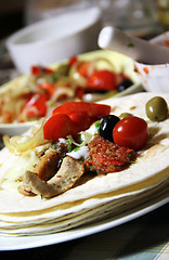 Image showing Mexican food with tortillas and nachos 	