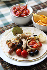 Image showing Mexican food with tortillas and nachos 	