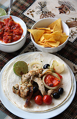 Image showing Mexican food with tortillas and nachos 	