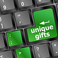 Image showing unique gifts, on the keyboard - holiday concept