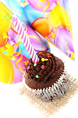 Image showing Festive Cupcake and funny hats.