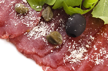 Image showing Beef carpaccio with rucola and parmesan 