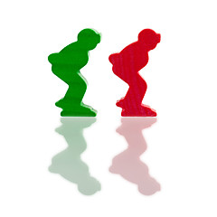 Image showing Two colored pawns isolated on a white background
