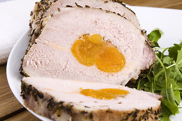 Image showing Roasted pork loin with dried apricots