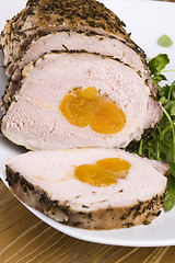 Image showing Roasted pork loin with dried apricots