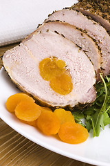 Image showing Roasted pork loin with dried apricots