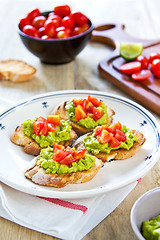 Image showing Crostini with avocado and tomato