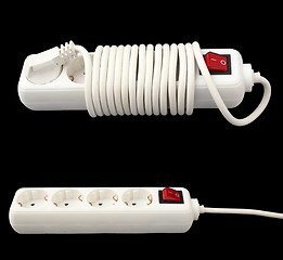 Image showing white electric splitter isolated over dark background