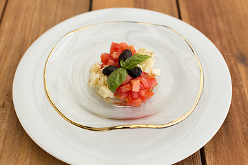 Image showing Mozzarella and tomatoes tartar