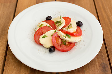 Image showing Delicious mozzarella, tomatoes salad